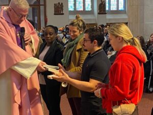 RCIA group receive the Bible on Mother's Day in Kilburn